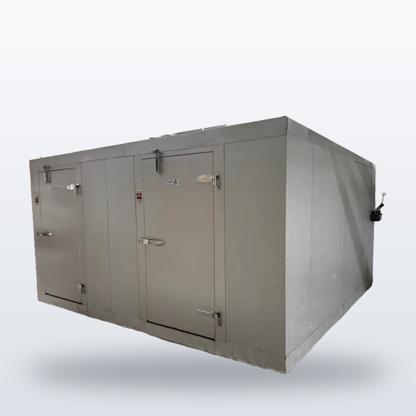 Snow Village custom walk-in cooler freezer combo unit with two doors, built and installed in New York